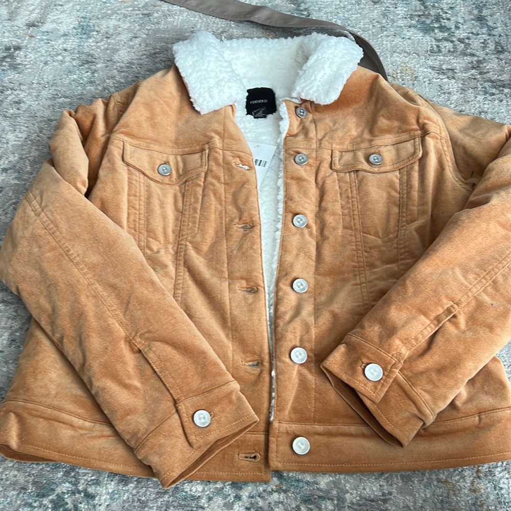 This is a light brown puffy jacket from forever 21.